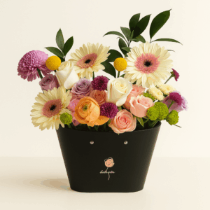 Belleza Radiante Fioretta – Arreglo floral en tonos pastel con gerberas y rosas.
